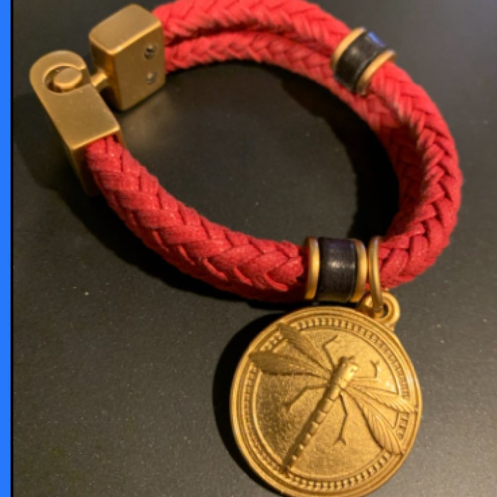 Rope bracelet with gold tone bee charm